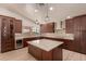 Modern kitchen with ample cabinetry, an island, and stainless steel appliances at 6325 E Monte Cristo Ave, Scottsdale, AZ 85254