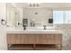 Elegant bathroom with double vanity and marble accents at 6325 E Monte Cristo Ave, Scottsdale, AZ 85254