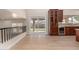 Bright kitchen with sliding glass door to backyard, wine fridge, and modern finishes at 6325 E Monte Cristo Ave, Scottsdale, AZ 85254
