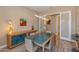 Modern dining room with glass-top table and access to hallway at 31709 N 55Th Way, Cave Creek, AZ 85331