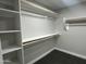 Spacious walk-in closet with hanging rods and shelves at 122 N Sunaire --, Mesa, AZ 85205