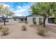 Brick house with green trim and desert landscaping at 1818 W Thomas Rd, Phoenix, AZ 85015