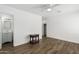 Bedroom with ceiling fan, nightstand, and en-suite bathroom at 1818 W Thomas Rd, Phoenix, AZ 85015