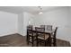 View of dining room from another angle, showing dark brown table and chairs at 1818 W Thomas Rd, Phoenix, AZ 85015