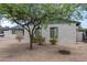 Brick house with green trim and desert landscaping at 1818 W Thomas Rd, Phoenix, AZ 85015
