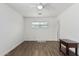 Bedroom with ceiling fan and dark brown nightstand at 1818 W Thomas Rd, Phoenix, AZ 85015