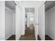 Hallway with closets and view to another room at 1818 W Thomas Rd, Phoenix, AZ 85015