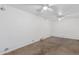 Large bonus room with exposed brick and concrete floor at 1818 W Thomas Rd, Phoenix, AZ 85015