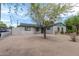 Brick house with green trim and desert landscaping at 1818 W Thomas Rd, Phoenix, AZ 85015