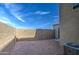 Small backyard with gravel and block wall at 8208 W Albeniz Pl, Phoenix, AZ 85043