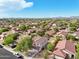 Aerial view of a residential neighborhood with numerous homes and lush landscaping at 1356 E 9Th Pl, Casa Grande, AZ 85122