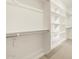 Large walk-in closet with shelves and hanging rods at 20279 N 224Th Dr, Surprise, AZ 85387