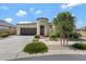 Single-story home with a front yard and driveway at 23406 S 225Th St, Queen Creek, AZ 85142