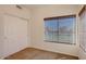 Spacious bedroom with double doors and neutral carpeting at 8805 S 51St St # 2, Phoenix, AZ 85044