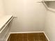 Walk-in closet with built-in shelving and hanging rod at 4608 W Maryland Ave # 144, Glendale, AZ 85301