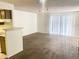 Living room with neutral carpet and sliding glass door at 4608 W Maryland Ave # 144, Glendale, AZ 85301