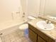 Clean bathroom with a single sink vanity, toilet and bathtub at 4608 W Maryland Ave # 144, Glendale, AZ 85301