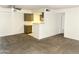 Open living room with view of kitchen and hallway at 4608 W Maryland Ave # 144, Glendale, AZ 85301