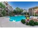 Community pool with fire pits and lounge chairs at 5350 E Deer Valley Dr # 4435, Phoenix, AZ 85054