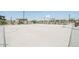 Community basketball court with seating areas at 24240 W Bowker St, Buckeye, AZ 85326