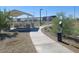 Relaxing picnic area with tables and benches under a shaded pergola at 24240 W Bowker St, Buckeye, AZ 85326