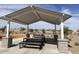 Covered picnic area with tables and benches, perfect for outdoor gatherings at 24240 W Bowker St, Buckeye, AZ 85326
