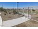 A paved pathway winds through a well-maintained community park at 24240 W Bowker St, Buckeye, AZ 85326