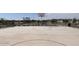 Full-size outdoor basketball court with benches at 24224 W Bowker St, Buckeye, AZ 85326