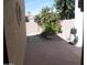 Backyard patio with desert landscaping and grill at 9728 N 106Th Pl # 154, Scottsdale, AZ 85258