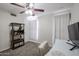 Home office with desk, chair, and built-in shelving at 7761 N 19Th Ln, Phoenix, AZ 85021