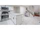 Modern kitchen with stainless steel appliances and island at 7761 N 19Th Ln, Phoenix, AZ 85021