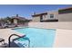 Community pool with ample space for sunbathing at 7761 N 19Th Ln, Phoenix, AZ 85021