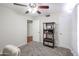 Bedroom with home office setup and built-in shelving at 7761 N 19Th Ln, Phoenix, AZ 85021