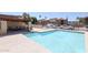 Sparkling community pool with nearby seating area at 7761 N 19Th Ln, Phoenix, AZ 85021