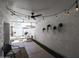 Bright patio with string lights, ceiling fan, and access to backyard at 7761 N 19Th Ln, Phoenix, AZ 85021