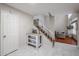 Bright entryway with staircase, wood flooring and built-in shelving at 7761 N 19Th Ln, Phoenix, AZ 85021