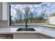 Kitchen sink with a view of the backyard pool and landscape at 6530 N 29Th St, Phoenix, AZ 85016