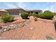 Landscaped front yard with desert landscaping and rock pathway at 18090 N Key Estrella Dr, Surprise, AZ 85374