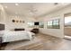 Main bedroom with large windows and wood floors at 3812 E Camelback E Rd, Phoenix, AZ 85018