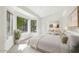 Bedroom with bay window and hardwood floors at 5302 E Mercer Ln, Scottsdale, AZ 85254
