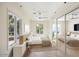 Bright bedroom with hardwood floors, and large windows at 5302 E Mercer Ln, Scottsdale, AZ 85254