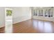 Spacious living area with hardwood floors and large windows at 5302 E Mercer Ln, Scottsdale, AZ 85254