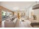 Spacious living area featuring hardwood floors and ample natural light at 5302 E Mercer Ln, Scottsdale, AZ 85254