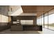 Modern kitchen with island, marble countertops, and city views at 5850 E Glen Dr, Paradise Valley, AZ 85253