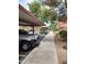 Covered parking with walkway and landscaping at 14950 W Mountain View Blvd # 1111, Surprise, AZ 85374