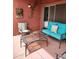 Furnished patio with seating and glass top table at 14950 W Mountain View Blvd # 1111, Surprise, AZ 85374