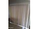 Beige vertical blinds covering a window at 14950 W Mountain View Blvd # 1111, Surprise, AZ 85374