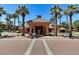 Community entrance with fountain and landscaping at 14950 W Mountain View Blvd # 1111, Surprise, AZ 85374