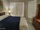 Spacious bedroom with ample natural light and a dresser at 14950 W Mountain View Blvd # 1111, Surprise, AZ 85374