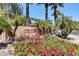 Las Solana Apartments entrance with lush landscaping and a welcoming atmosphere at 14950 W Mountain View Blvd # 1111, Surprise, AZ 85374